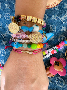 Bandana bracelet with lucky charms pink